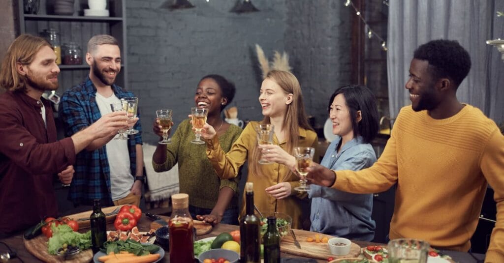 multi-ethnic-group-toasting-at-a-celebration