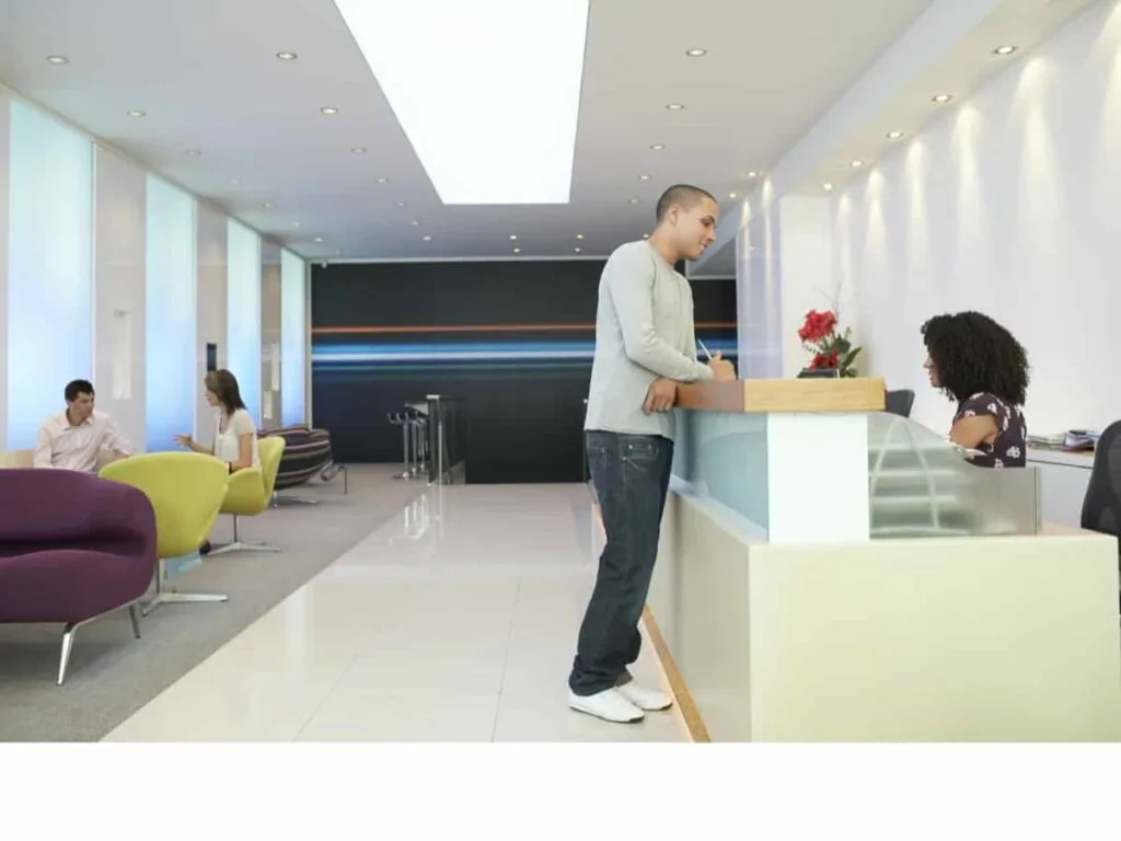 man checking into a hotel