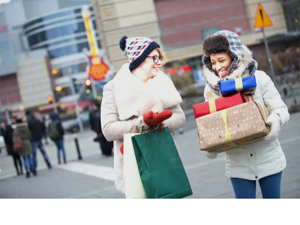 friends on a shopping spree in the winter