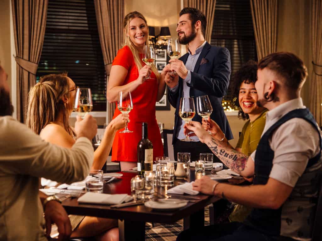 couple toasting at anniversary party