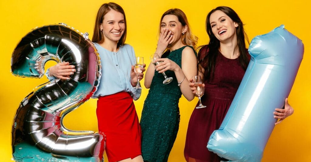 3-ladies-holding-21st-birthday-balloons