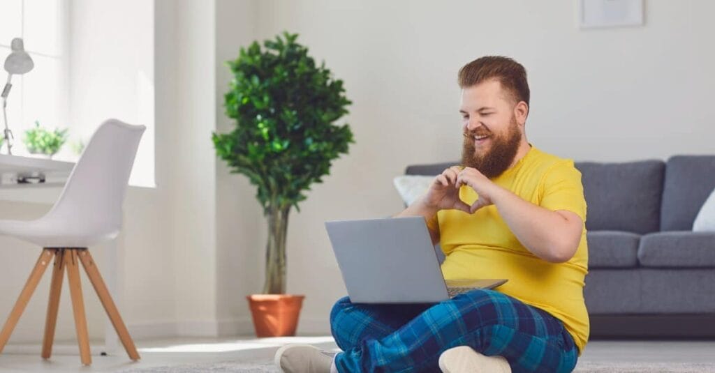 man in long distance relationship showing love to his partner